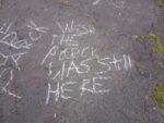 Chalk slogan saying "Wish the park was still here"