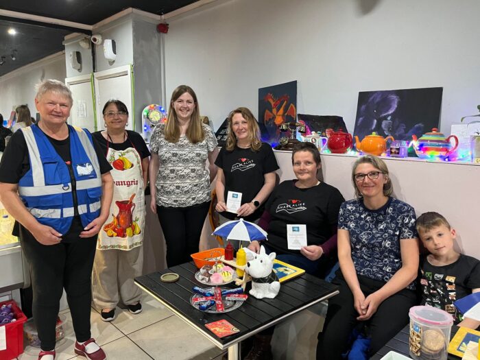 Gillian Mackay MSP and Cllr Kirsten Robb with volunteers at Share Alike, East Kilbride